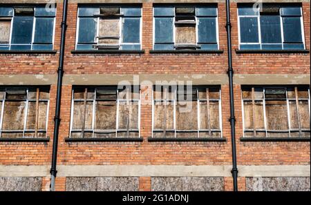 Abandoned building boarded up in Liverpool city centre Stock Photo