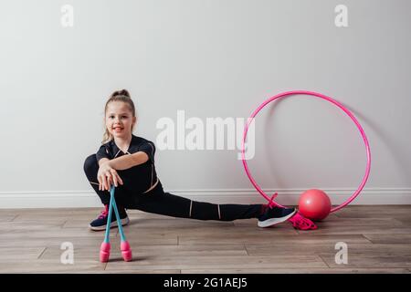 Gymnastic equipment. Skipping rope, clubs for rhythmic gymnastics and ball  Stock Photo - Alamy