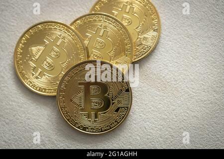 Bitcoin physical coin on white background. Stock Photo