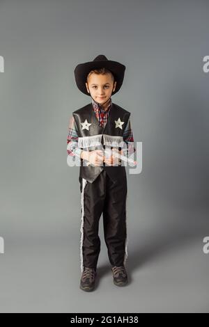 The little boy in a sheriff's costume full length Stock Photo