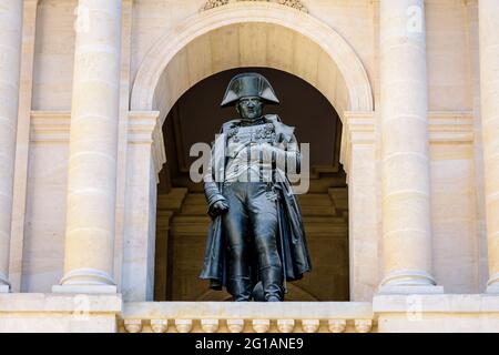 Close-up view of the statue of Napoleon Bonaparte on the balcony of the southern facade of the court of honor of the Hotel des Invalides in Paris. Stock Photo