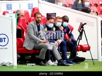 England manager Gareth Southgate (left), assistant manager Steve Holland, coach Graeme Jones, and coach Chris Powell during the international friendly match at Riverside Stadium, Middlesbrough. Picture date: Sunday June 6, 2021. Stock Photo