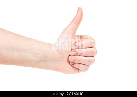 Caucasian woman hand with thumb up gesture sign showing ok isolated on white background. Stock Photo
