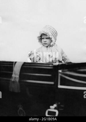 File photo dated 03/05/1928 of Princess Elizabeth - daughter of the Duke and Duchess of York (later King and Queen of England) - waving from the carriage as she drives in London in 1928. The Duchess of Sussex gave birth to a 7lb 11oz daughter, Lilibet 'Lili' Diana Mountbatten-Windsor, on Friday in California and both mother and child are healthy and well, Meghan's press secretary said. Issue date: Sunday June 6, 2021. Stock Photo