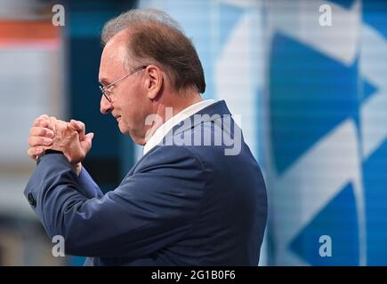 Magdeburg, Germany. 06th June, 2021. Reiner Haseloff (CDU), Minister President of Saxony-Anhalt, gestures in the exhibition hall. Credit: Robert Michael/dpa/Alamy Live News Stock Photo