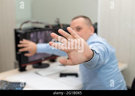 man outstretched hand and showing stop hand sign Stock Photo