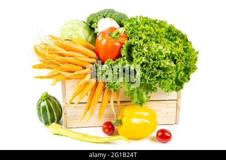 Fresh vegetables in wooden box Stock Photo