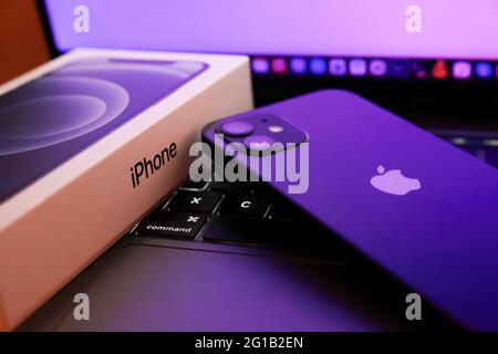 Tokyo, Japan. 06th June, 2021. In this photo illustration, Apple's iPhone 12 seen placed on a MacBook Pro. (Photo by Stanislav Kogiku/SOPA Images/Sipa USA) Credit: Sipa USA/Alamy Live News Stock Photo