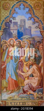 Painting of Jesus healing a blind beggar near Jericho (Luke 18:35). Votivkirche – Votive Church, Vienna, Austria. Stock Photo