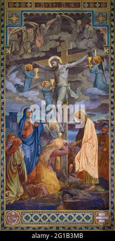 Fresco of the Crucifixion of Jesus Christ in the Votivkirche – Votive Church, Vienna, Austria. Stock Photo