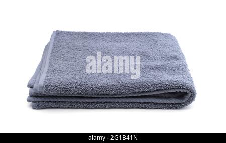 Gray terry folded bath towel isolated on white. Stock Photo