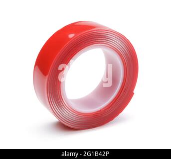 Roll of red double-sided tape isolated on white. Stock Photo