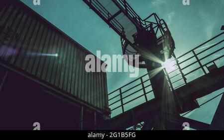 Look at the sky in a dreamy atmosphere in the heart of industrial culture on the steel frame in the landscape park Duisburg Nord. steel mill, colliery. Stock Photo