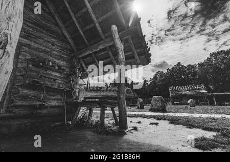 Fort fortifications from the Middle Ages in the open-air museum in midsummer. Independent defense facility as an escape facility in the village. Stock Photo