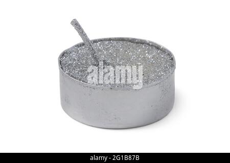 Festive tea candle with sparkles isolated on white background Stock Photo