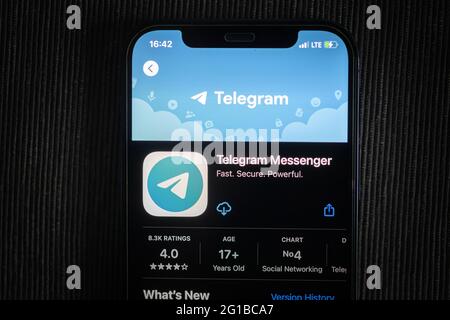 Telegram app in the apple App Store seen on an iPhone 12 screen. Stock Photo