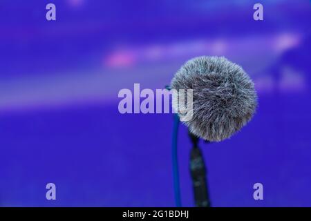 directional microphone on a football field to record the sound of a match Stock Photo