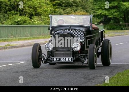 Ford Model T 1930 30s 3300cc driving on the M6 motorway near Preston in Lancashire, UK. Stock Photo