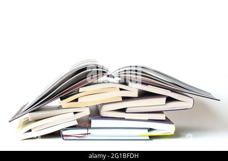 Stack of hardcover books on white background Stock Photo