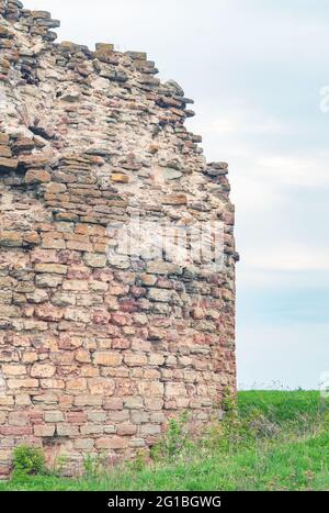 Ruins of an old fortress from the 17th century. Old destroyed brickwork against the sky. Stock Photo