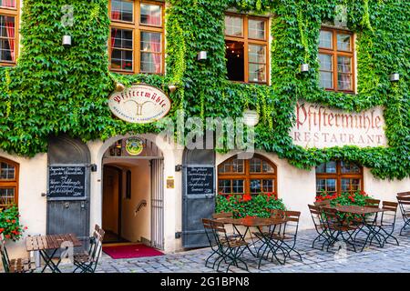 Outer facade of the heritage Pfiftermuhle Restaurant in Munich Germany Stock Photo