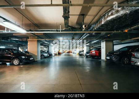 Underground garage or modern car parking in mall. Stock Photo