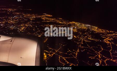 Night Cityscape From Airplane Window In The Sky Stock Photo Alamy