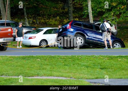 A tourist accidentally parked their vehicle in a drainage ditch along a road within Shenandoah National Park, Virginia, USA. Stock Photo