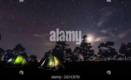 tents at night in moonlight at corona forestal on tenerife Stock Photo