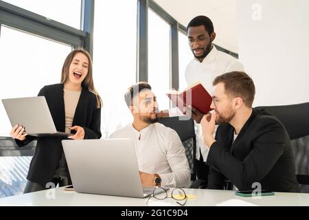 Meeting of the team of software developers in the office Stock Photo