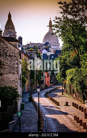 A VIEW OF L'ABREUVOIR STREET WITH 'LA MAISON ROSE' PAINTED BY MAURICE UTRILLO, SACRE COEUR BASILICA ON MOUND MONTMARTRE DISTRICT, PARIS, FRANCE Stock Photo