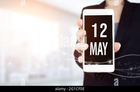 May 12nd. Day 12 of month, Calendar date. Yellow sheet of the calendar.  Spring month, day of the year concept Stock Photo - Alamy