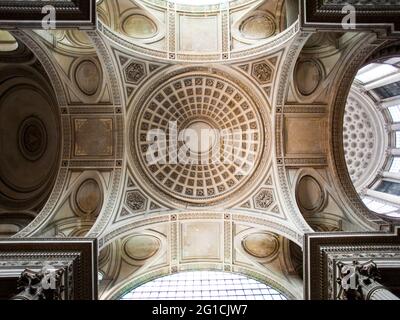 Interior of the Pantheon showing the inside of the dome alongside intricate tiles, and architectural columns, Paris, France, 2012 Stock Photo