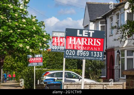 London, UK - 10 May, 2021 - Estate agent signs advertising home for rent or sale around Kensal Rise Stock Photo