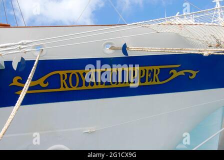 The name 'Royal Clipper' on the bow of the five-masted tall ship while berthed in Barbados, Caribbean sailing as a luxury cruise liner Stock Photo