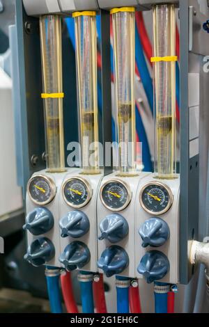 Flowmeter, rotameter - flow regulator for cooling system of injection machine Stock Photo
