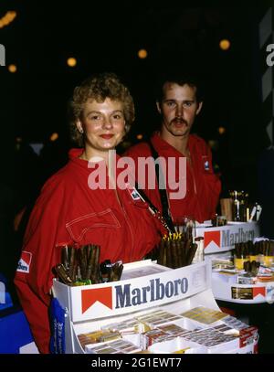 people, profession, cigarette seller, two cigarette dealers with vendor's  tray, half-length, 1980s, ADDITIONAL-RIGHTS-CLEARANCE-INFO-NOT-AVAILABLE  Stock Photo
