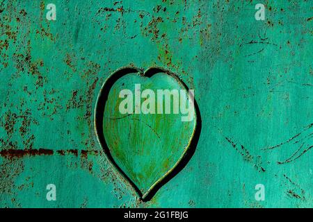 Iron fence. Heart on the wicket. The heart is on the metal fence. Stock Photo