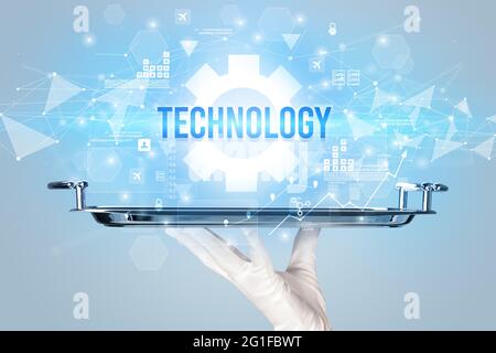 Waiter serving new technology concept Stock Photo