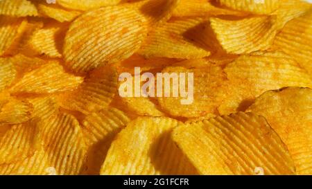 Rippled chips on a sunny day close up Stock Photo
