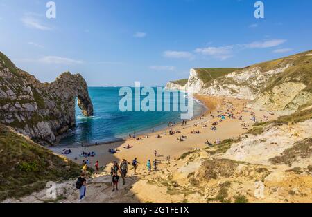 Panoramic coastal clifftop view of picturesque Durdle Door rock formation on the Jurassic Coast World Heritage site in Dorset, south-west England Stock Photo