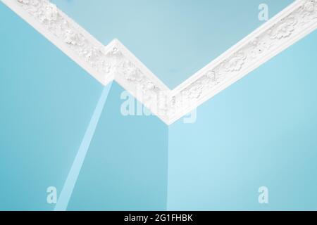 stucco ceiling and blue painted walls renovated flat   - Stock Photo