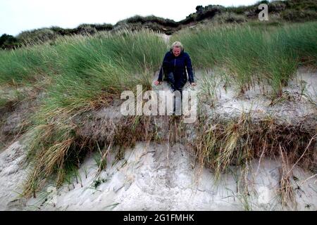 Camusdarach Beach, Beach, Marram Grass, Woman, Arisaig, Mallaig, West coast, Highlands, Highland, Scotland, United Kingdom Stock Photo