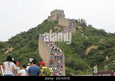 Tourists ascending The Great Wall of China in Beijing, Peoples Republic of China. Stock Photo