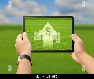 Farmer using digital tablet for agribusiness processes automatization Stock Photo