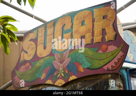 Brightly decorated Sugar cane plantation lorry at The Eden Project Rainforest Biome Cornwall UK, May 2021 Stock Photo