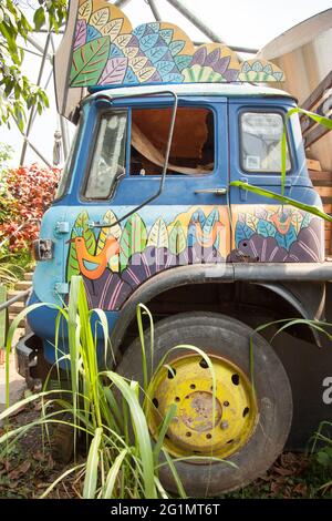 Brightly decorated Sugar cane plantation lorry at The Eden Project Rainforest Biome Cornwall UK, May 2021 Stock Photo