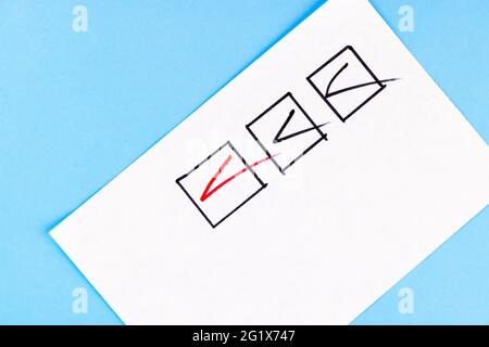 Red marking on checklist box with pen, Checklist concept. Stock Photo