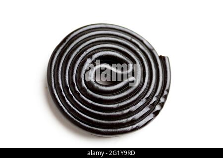 Closeup shot of black licorice isolated on a white background Stock Photo