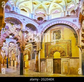 CORDOBA, SPAIN - SEP 30, 2019: The alfiz (blind arcade), multifoil arches and mihrab of maqsura (caliph's or emir's praying area) in Mezquita, on Sep Stock Photo